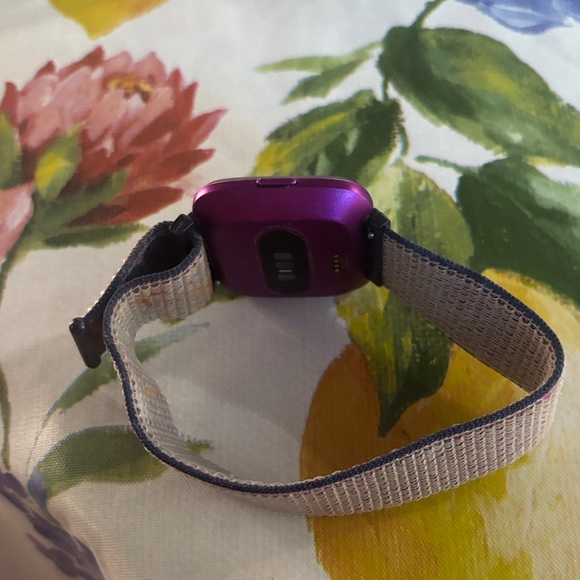 Fitbit Smartwatch with Purple Frame and Multicolor Band